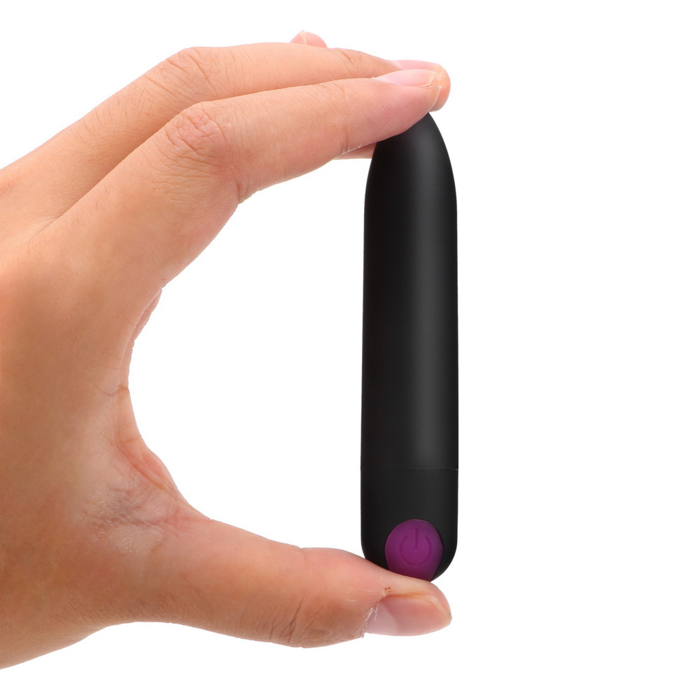 Vibrador Bullet Ogiva Recarreg�vel Preto, em m�o feminina, vista lateral