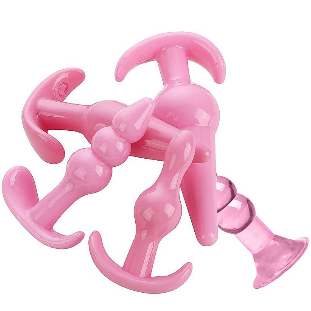 Conjunto de plugs anal rosa em TPE, com o quinto plug (escalonado) em primeiro plano, mostrando detalhes do design de esferas e base de seguran�a