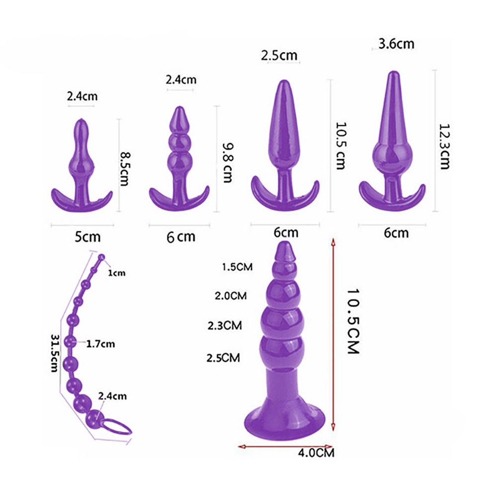 Plugs anais roxos do kit dispostos individualmente, destacando suas bases de seguran�a e diferentes designs para estimula��o anal