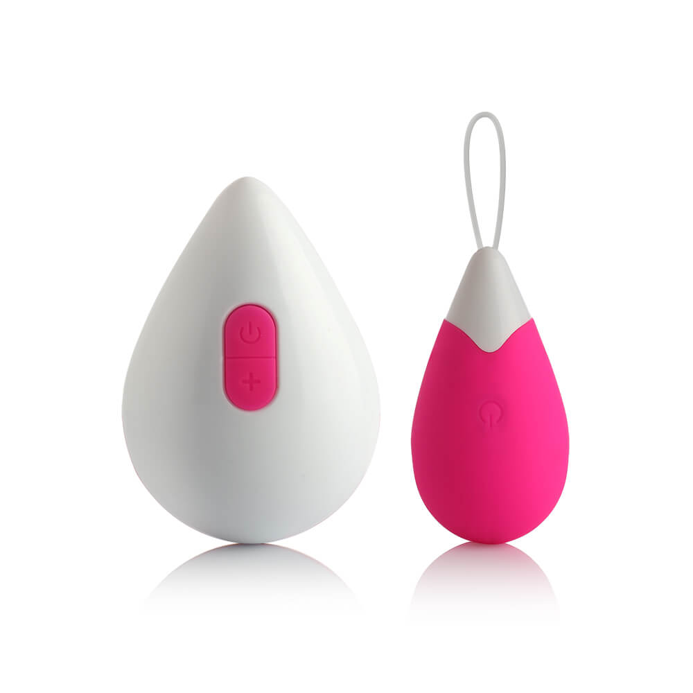 Vibrador Bullet Recarreg�vel em Silicone com 10 Vibra��es Controle sem Fio WE Pink e seu controle remoto sem fio, lado a lado