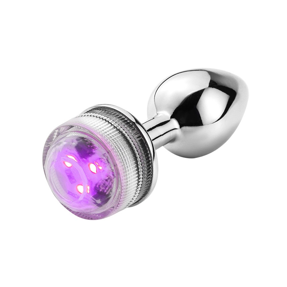 vista lateral do plug anal joia em a�o inox com LED evidenciando formato anat�mico e propor��o de 7 x 2,7cm