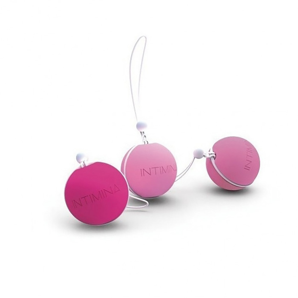 Kit de 3 bolas de pompoarismo Laselle pink, com pesos distintos, em um fundo branco, destacando o design e a praticidade