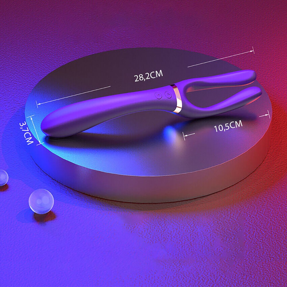 Detalle do Vibrador Masculino em Silicone Recarreg�vel Roxo mostrando entrada USB e bot�es de controle