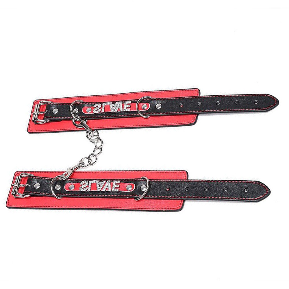 Algema Slave em PU Vermelho e Preto aberta, mostrando o sistema de ajuste com fivela e os orif�cios de regulagem