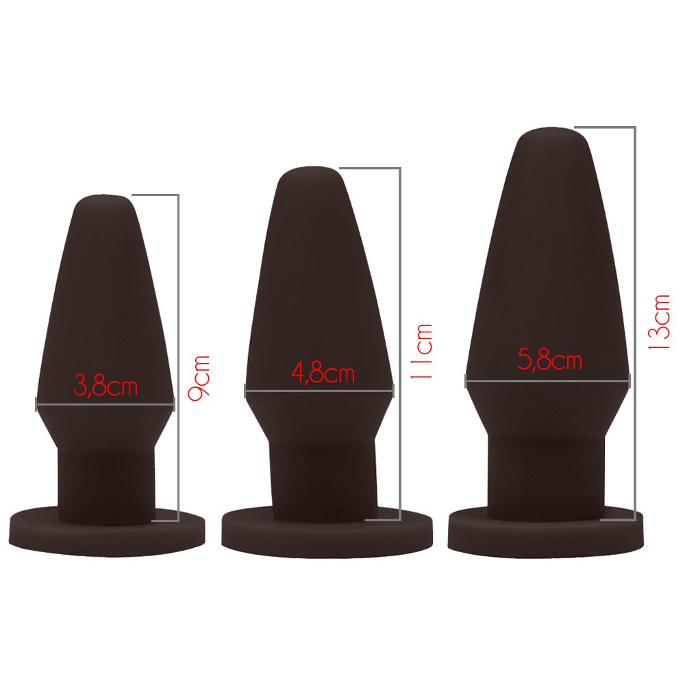 Vista superior dos plugs anais marrons, mostrando o formato arredondado das bases e a colora��o homog�nea do PVC