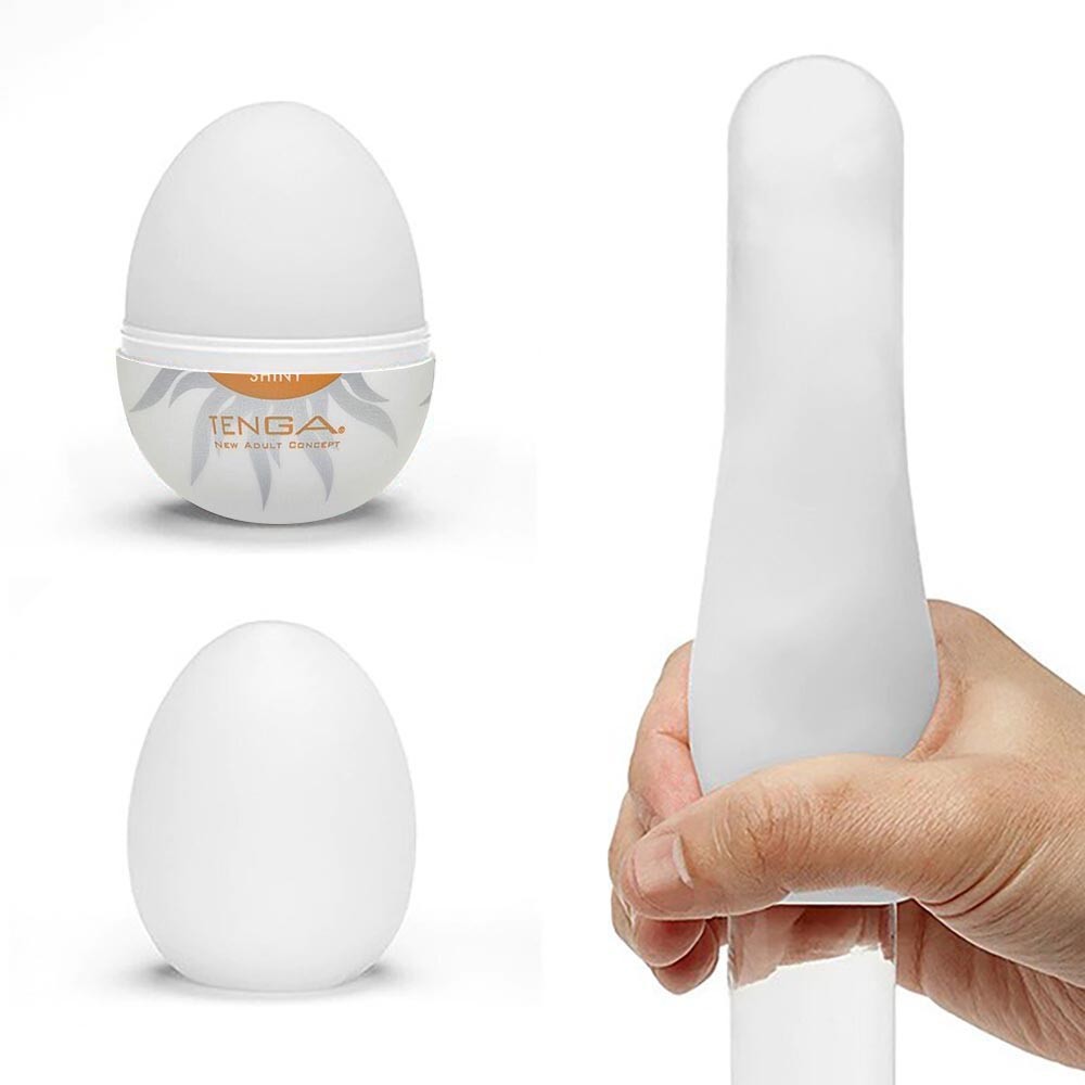 Masturbador Tenga Egg Shiny Hard Boiled aberto, mostrando a manga interna esticada e o material flex�vel
