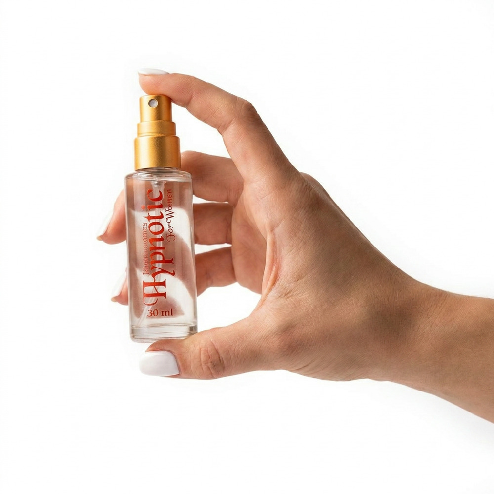 M�o feminina segurando frasco de Perfume Afrodis�aco Hypnotic 30ml, mostrando o tamanho do produto