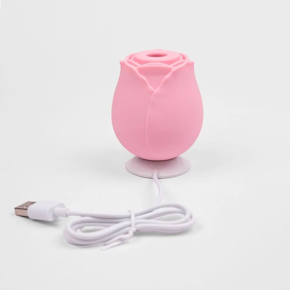 Vista superior do Vibrador para Clit�ris Fl� Rosa, detalhando a abertura do bocal de estimula��o e o design sim�trico.