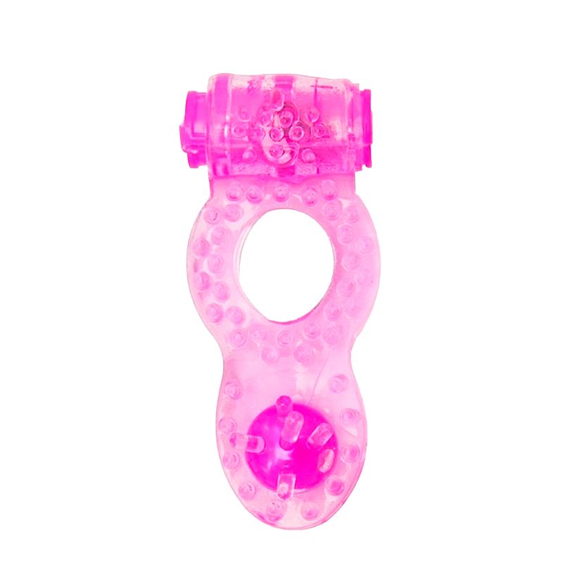 Anel peniano com estimulador anal e vibrador rosa em vista superior, mostrando o anel, o vibrador e o plug anal