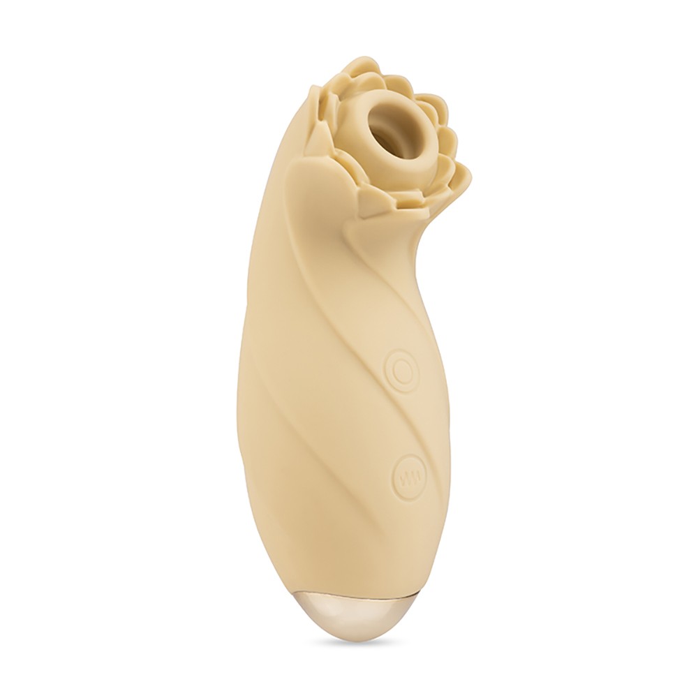 Estimulador de Clit�ris White Lotus, vista lateral completa do estimulador na cor bege, mostrando o corpo em silicone texturizado em ondas e o orif�cio de suc��o no topo