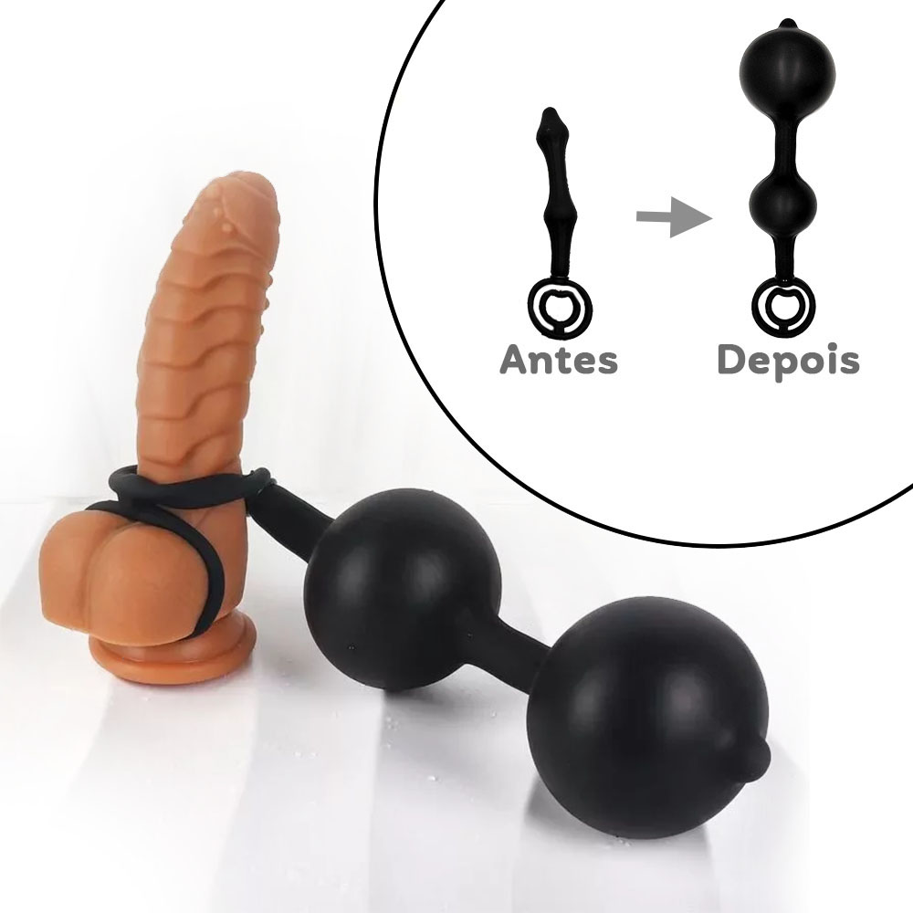 Plug anal infl�vel preto com an�is peniano e escrotal, mostrando o plug desinflado e inflado ao lado de um p�nis com an�is de teste