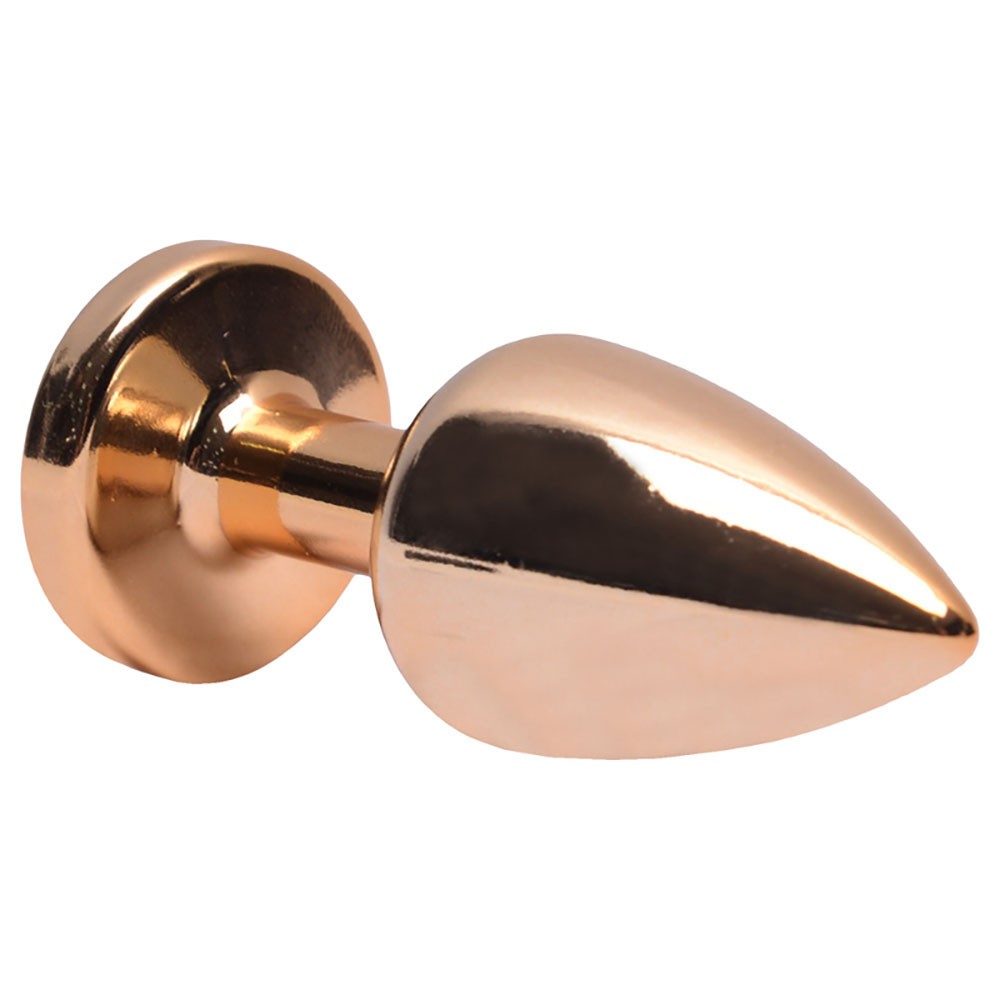 imagem ambientada do plug anal joia em ABS dourado com pedra vermelha destacando eleg�ncia e discri��o