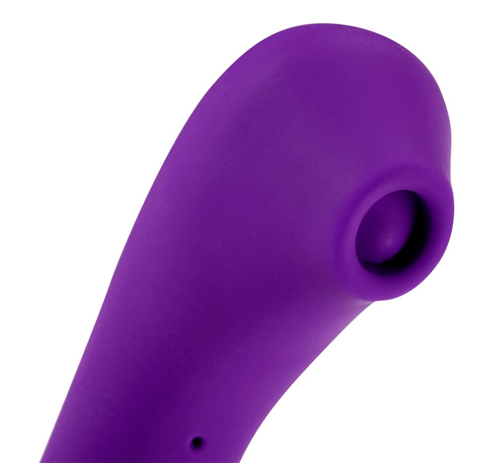 Vibrador Secret Kiss Roxo. Close-up da ponta ergon�mica projetada para estimula��o direta do clit�ris. Detalha a textura e o formato do bico.