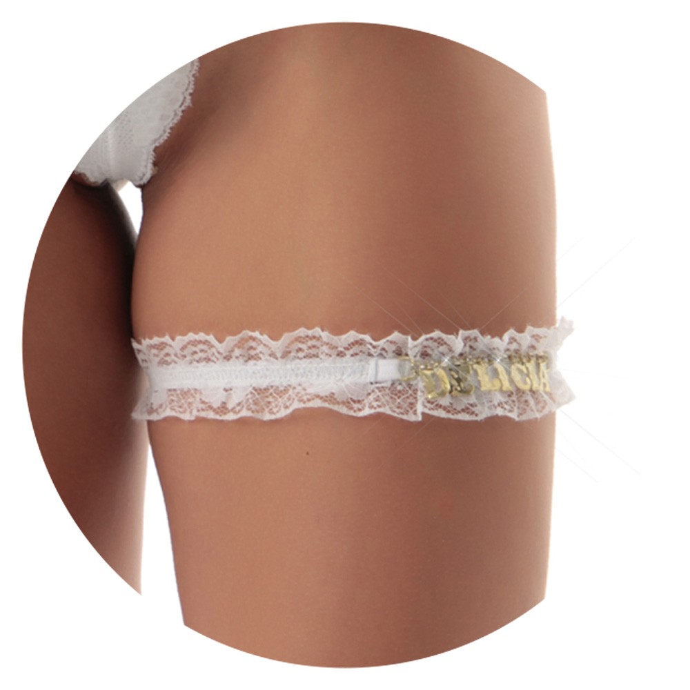 Perneira Persex Sexy Branca em destaque aproximado dos detalhes de renda e strass com texto Del�cia