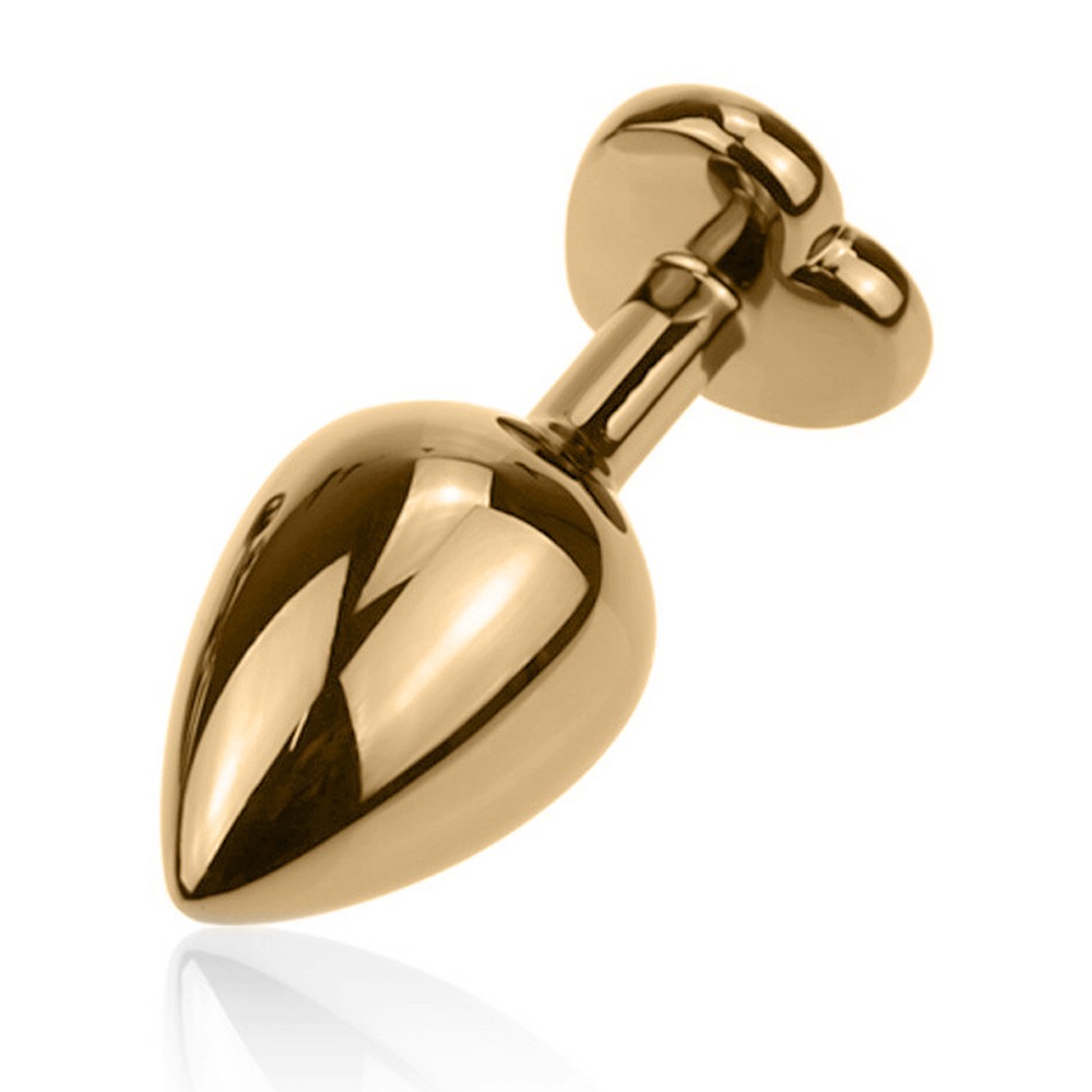 Imagem ambientada do plug anal joia em a�o inox dourado com cristal pink cora��o destacando eleg�ncia e impacto visual