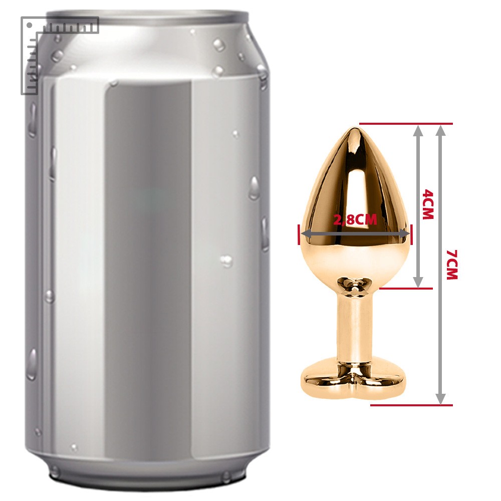 Close na ponta anat�mica em gota do plug anal de metal dourado para inser��o gradual segura e confort�vel