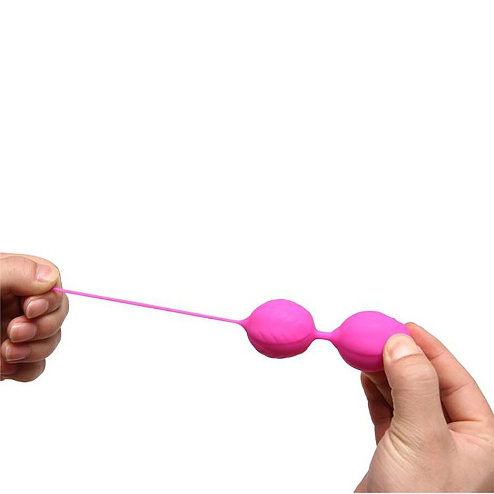 Bolas BenWa para Pompoarismo em Silicone e ABS Pink - Vis�o de perto da al�a de remo��o e conex�o entre as bolas