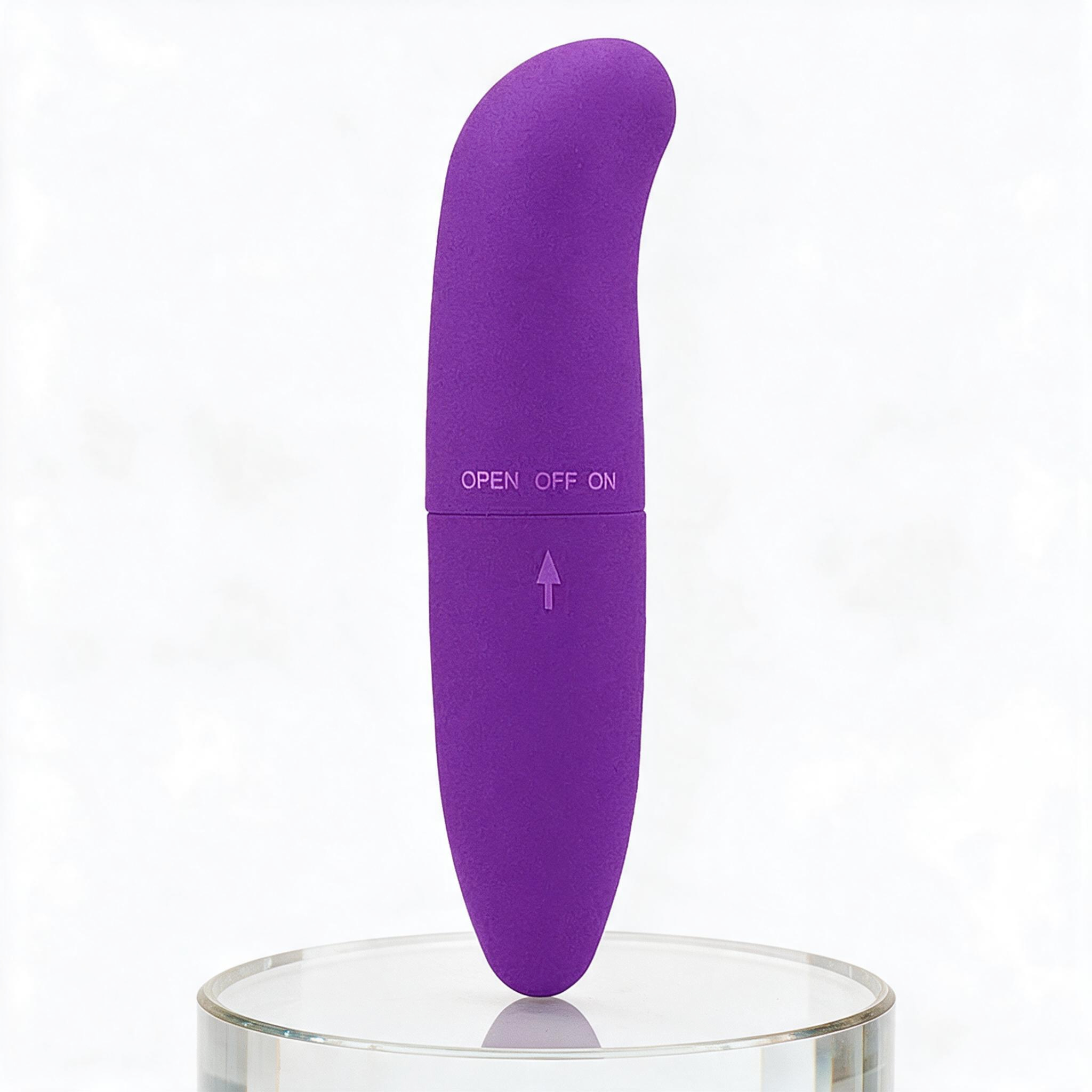 Vibrador Ponto G Liso Feito em Pl�stico R�gido Roxo - vista em perspectiva da curva do vibrador