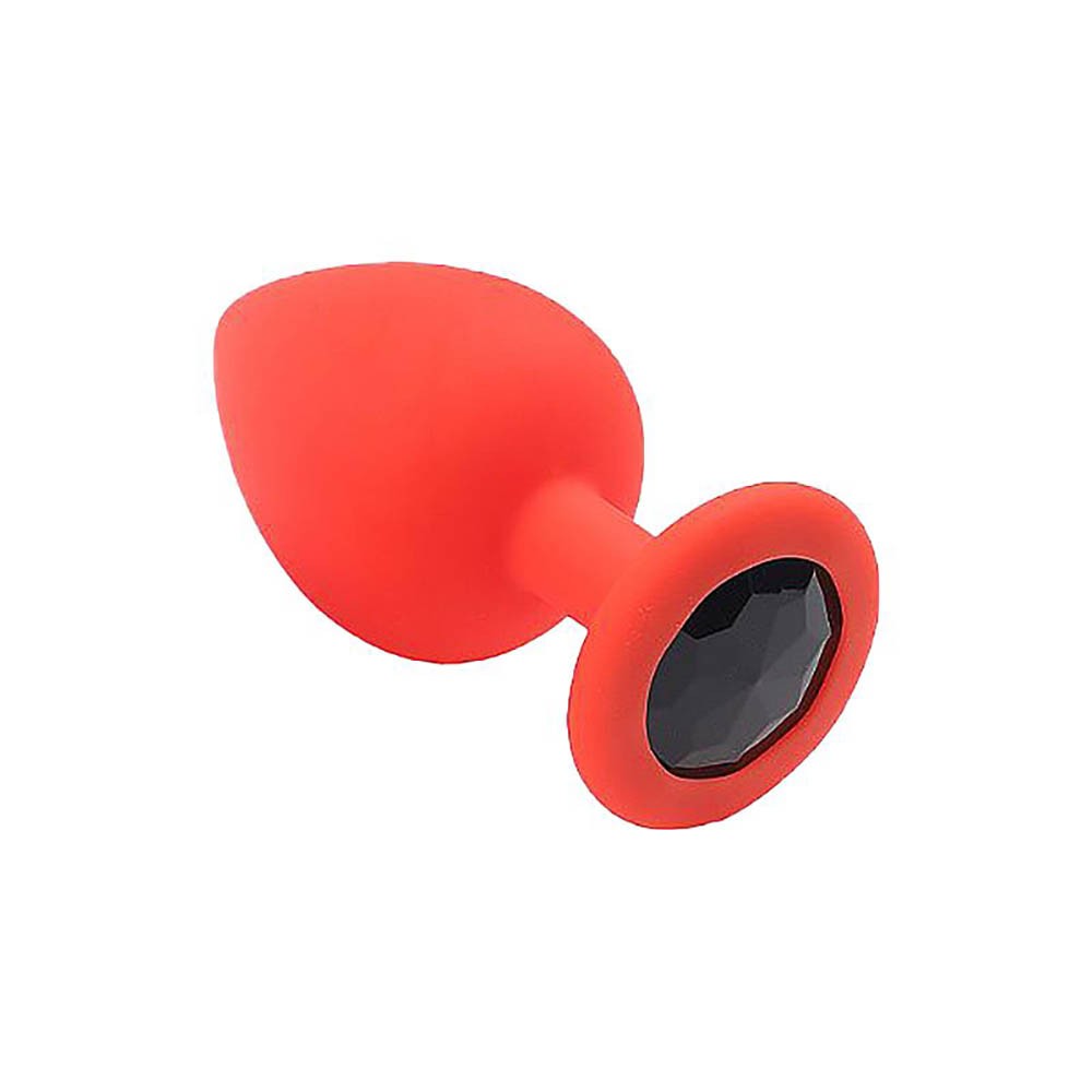 Imagem ambientada do Plug Anal Joia em Silicone Vermelho com Base Redonda e Pedra Preta, destacando seu design elegante