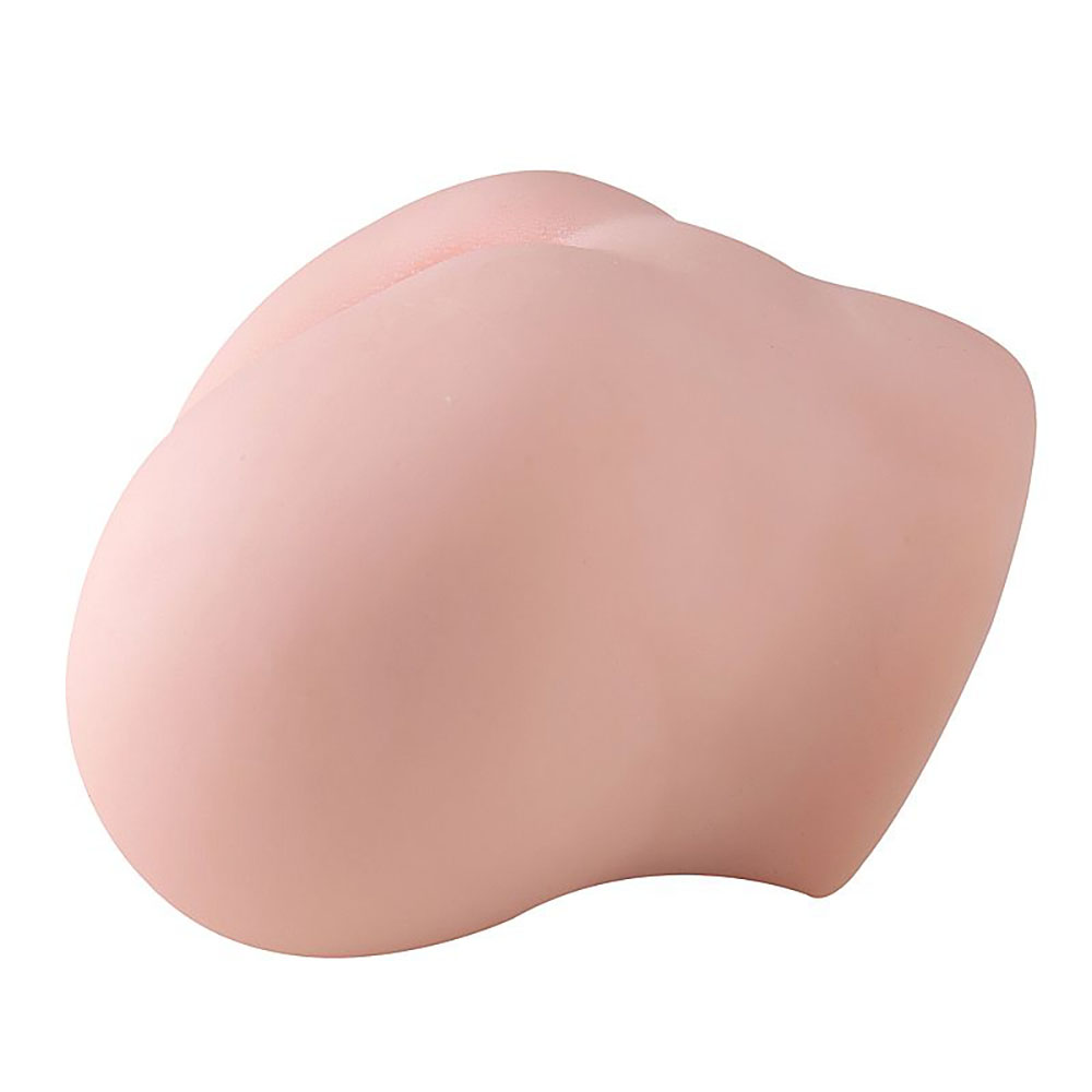 Masturbador Bunda Maig em Cyberskin Bege, vista lateral com foco no design ergon�mico e maciez do material