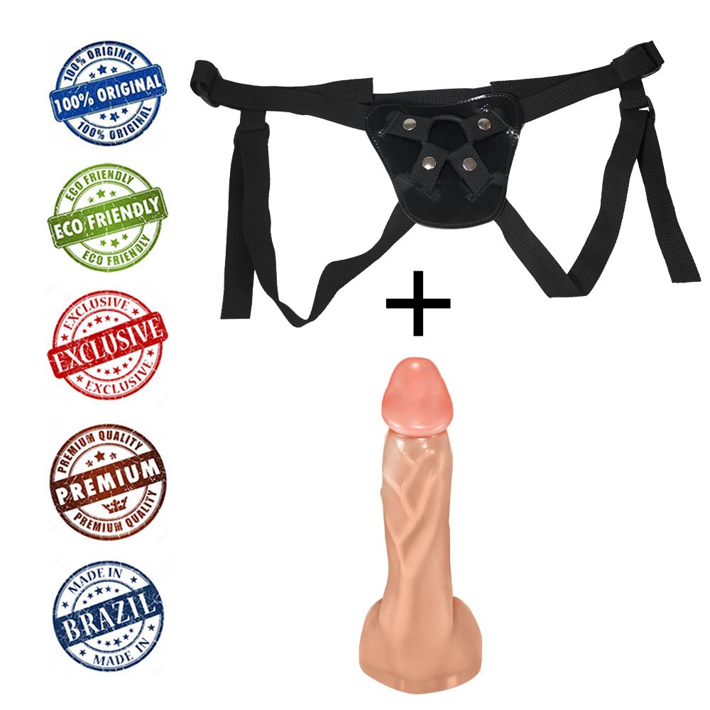 Cinta peniana ajust�vel com p�nis real�stico bege vista lateral, mostrando o encaixe do p�nis na cinta preta e detalhes da regulagem