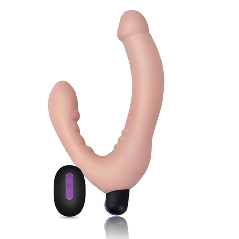 Cinta Peniana para Ela em TPR Bege com controle sem fio, vista de cima, mostrando o formato curvado e anat�mico.