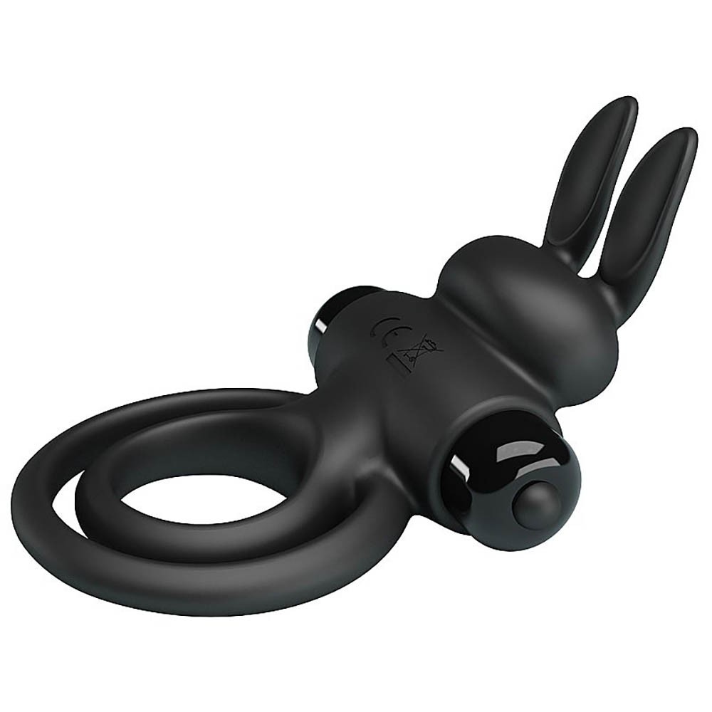 Anel peniano e escrotal em silicone preto, vista lateral destacando o estimulador vibrat�rio e os an�is flex�veis