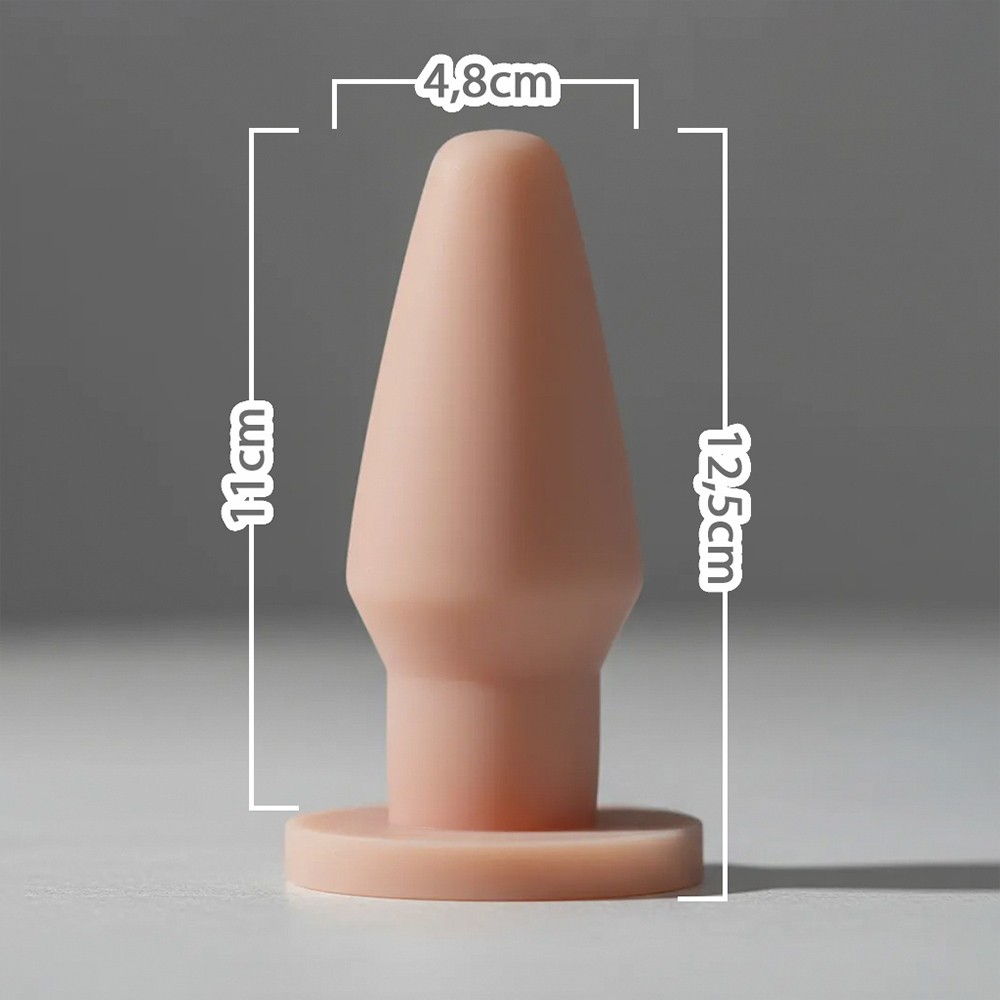 Close da ponta c�nica do plug anal bege, ideal para uma inser��o gradual e confort�vel