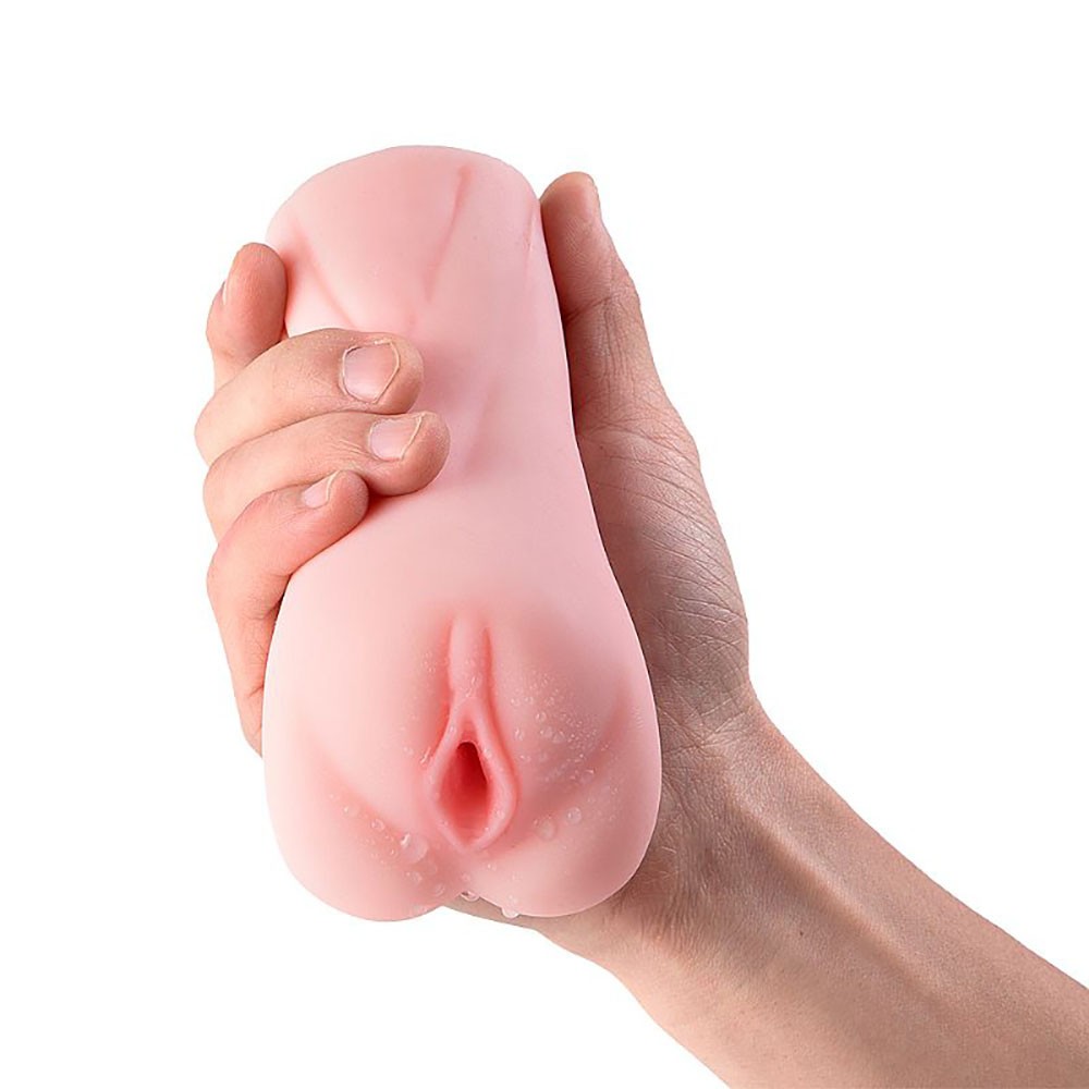 Masturbador Sara em Cyberskin, vista superior com foco na textura interna da vagina, molhada