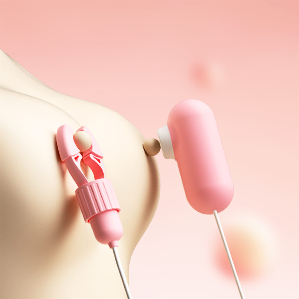Prendedor de Mamilo e Vibrador de Clit�ris em uso simulado, com pin�a no mamilo e vibrador no clit�ris, mostrando a dupla estimula��o