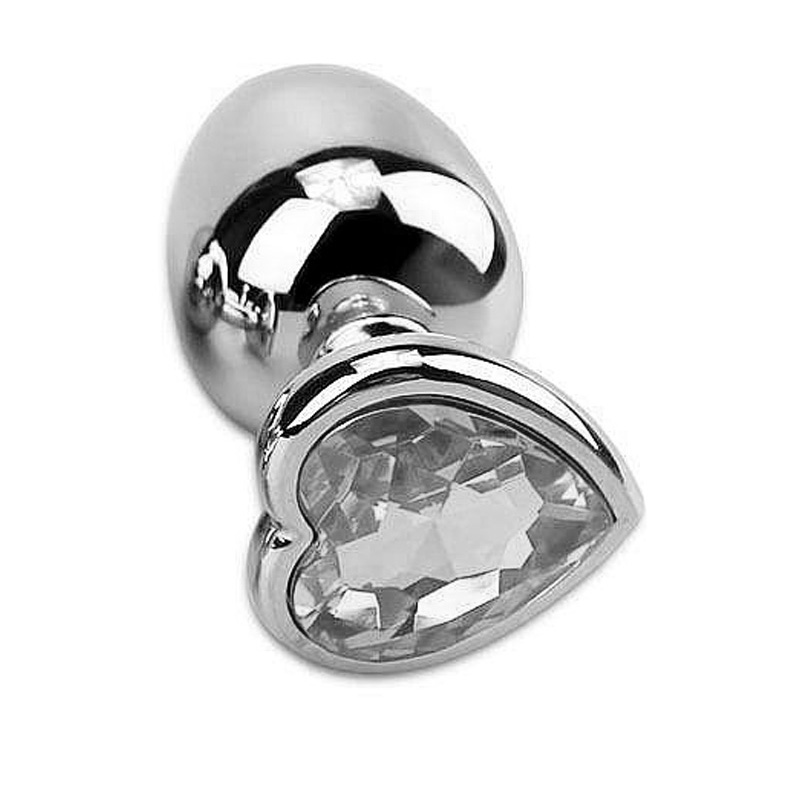 Plug Anal Joia em Aco Coracao Tamanho P Transparente em um cenario luxuoso, realcando sua estetica premium e convite ao prazer