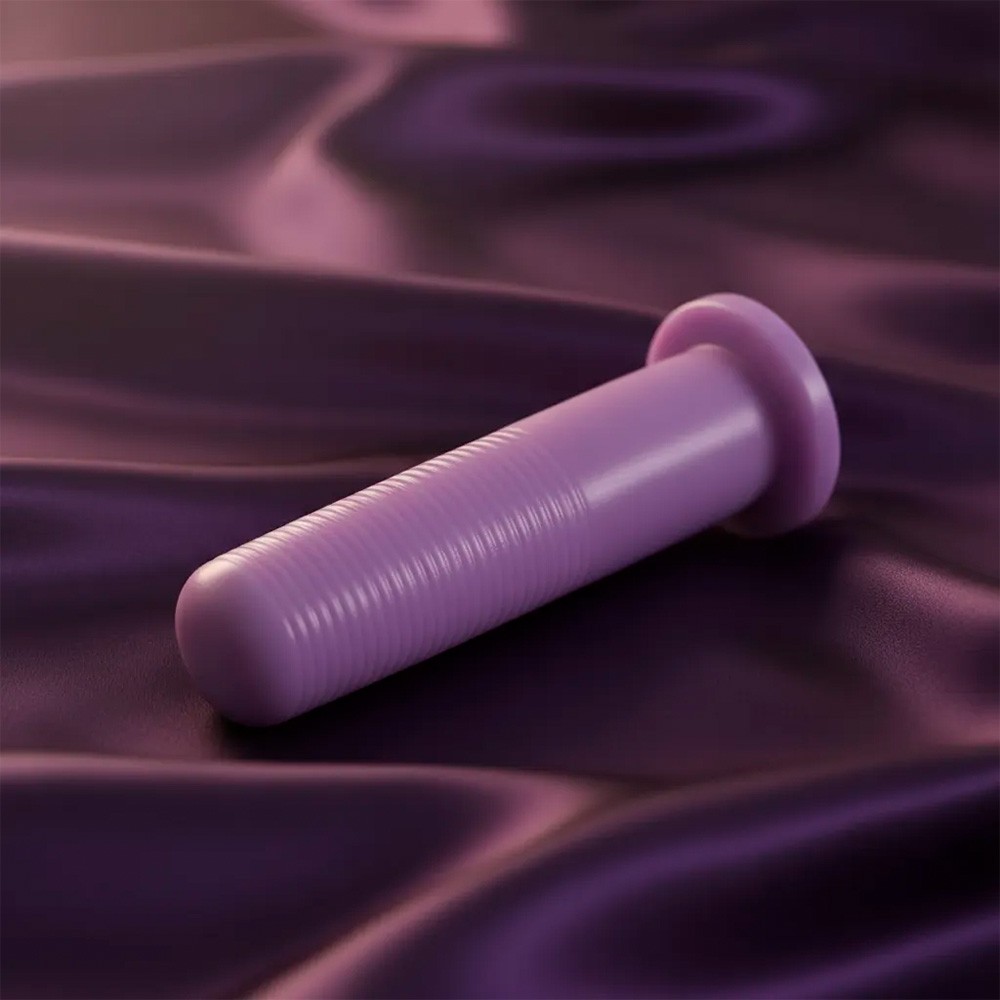 Plug Anal KCT flex�vel roxo em uma superf�cie de seda, destacando seu formato e cor