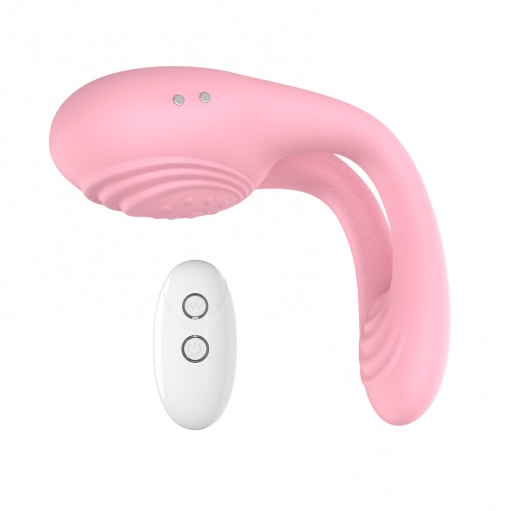 Anel Peniano em Silicone Com Estimulador de Clit�ris 7 Vibra��es Recarreg�vel e Controle Candy Pink | Vista lateral do anel com estimulador e controle