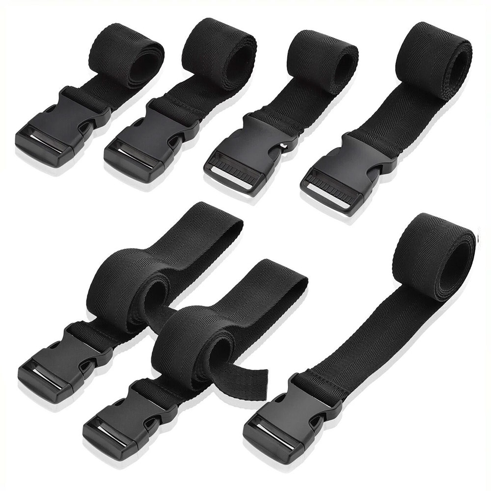 Conjunto de 7 cintos de imobiliza��o BDSM pretos em nylon, mostrando fivelas de libera��o r�pida abertas e o tecido