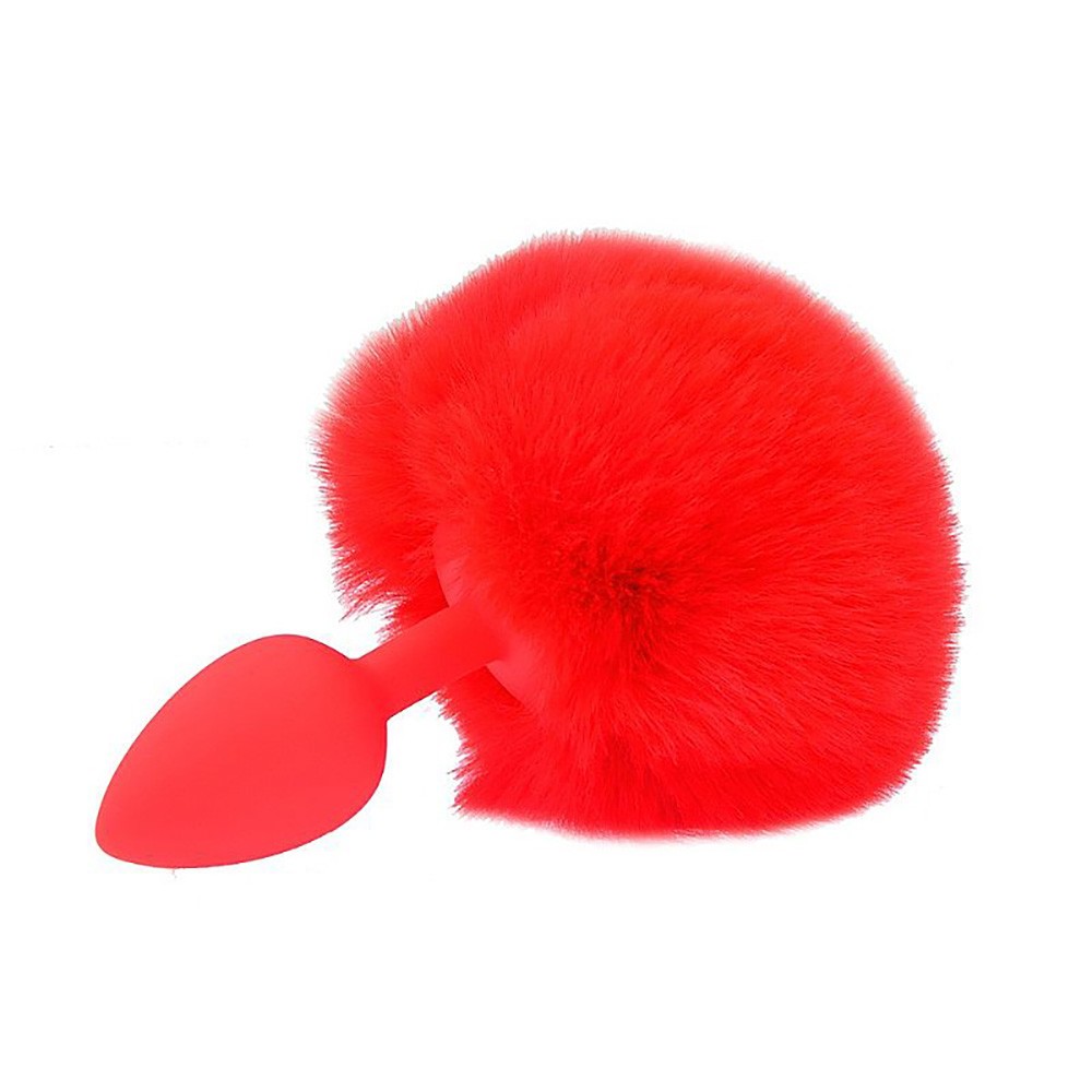 plug anal de silicone vermelho com rabo peludo, vista lateral destacando o toque aveludado do rabo