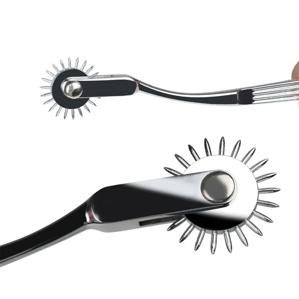 Roda de Wartenberg com Pinos Grandes em A�o Inox, vista superior com close nos pinos e na empunhadura