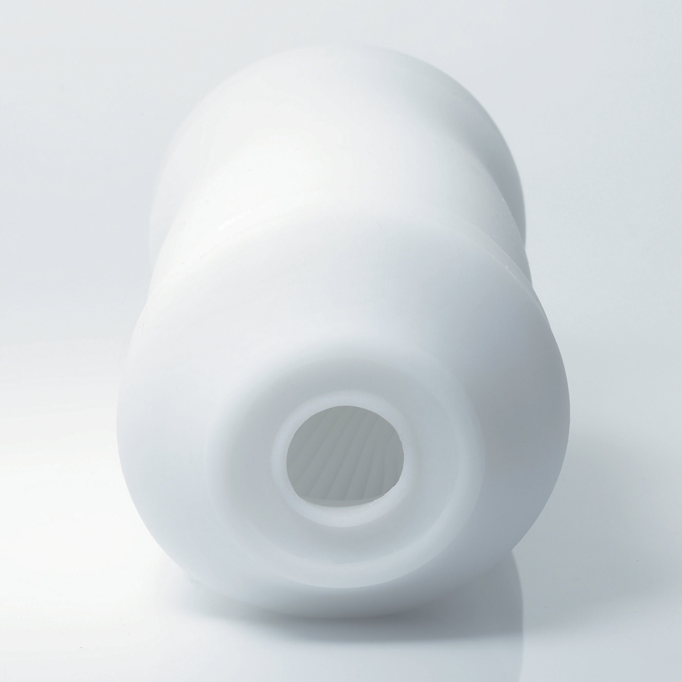 Vis�o interna detalhada do Masturbador Tenga 3D Module, mostrando a entrada e o padr�o de blocos em espiral