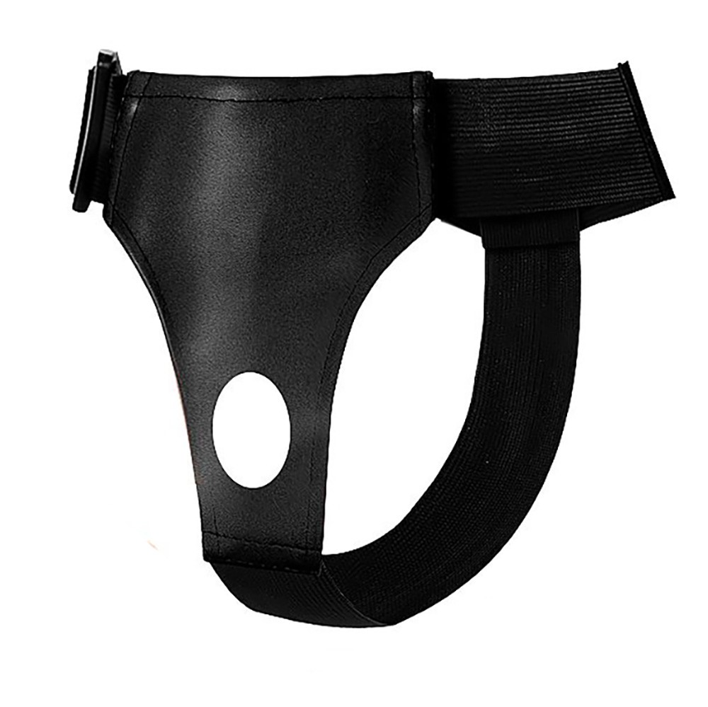 Cinta preta com um orif�cio vazado. O suporte da cinta � feito de material flex�vel, mostrando sua adaptabilidade para diferentes formatos de p�nis.