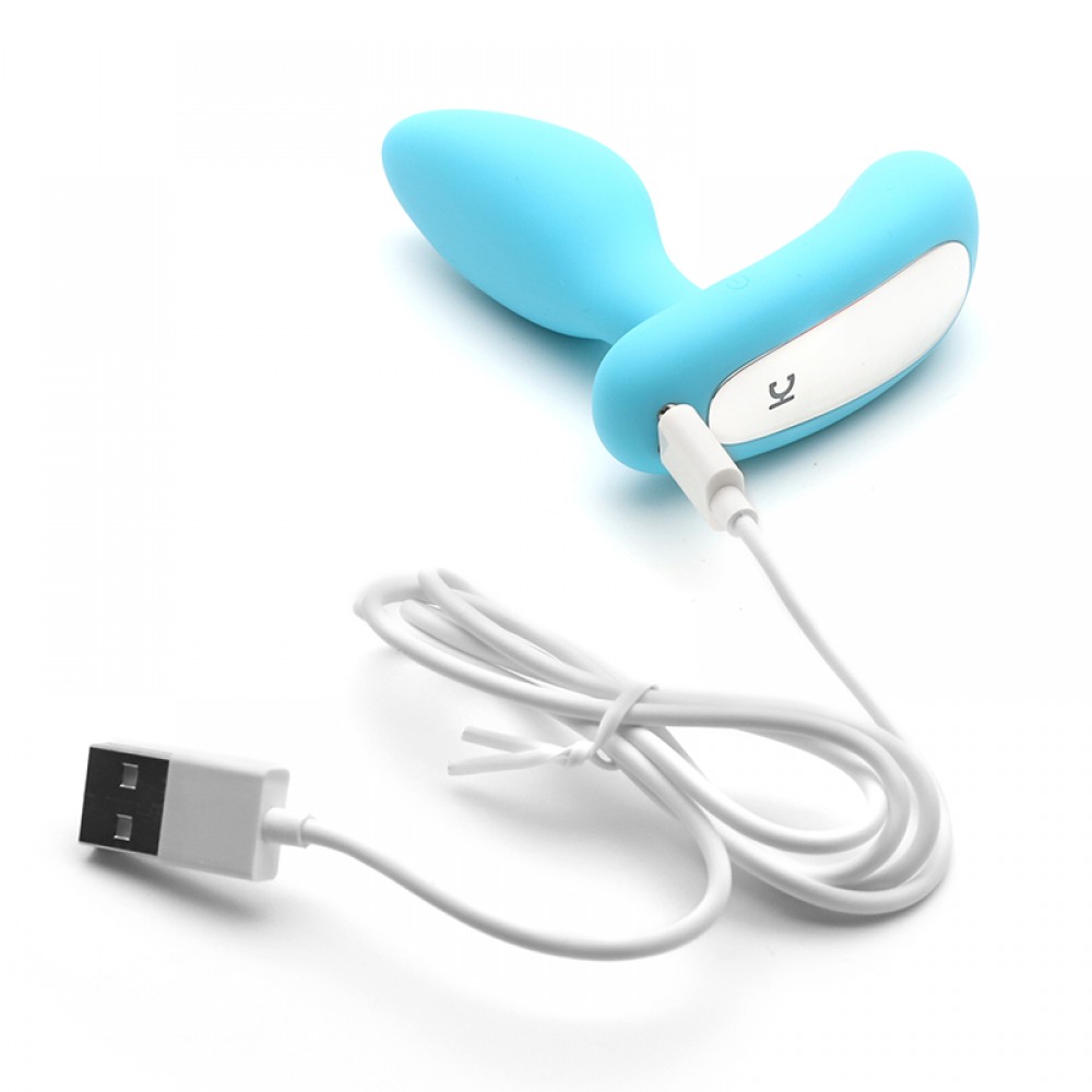Estimulador de Pr�stata Gordon Cyan sendo recarregado via cabo USB