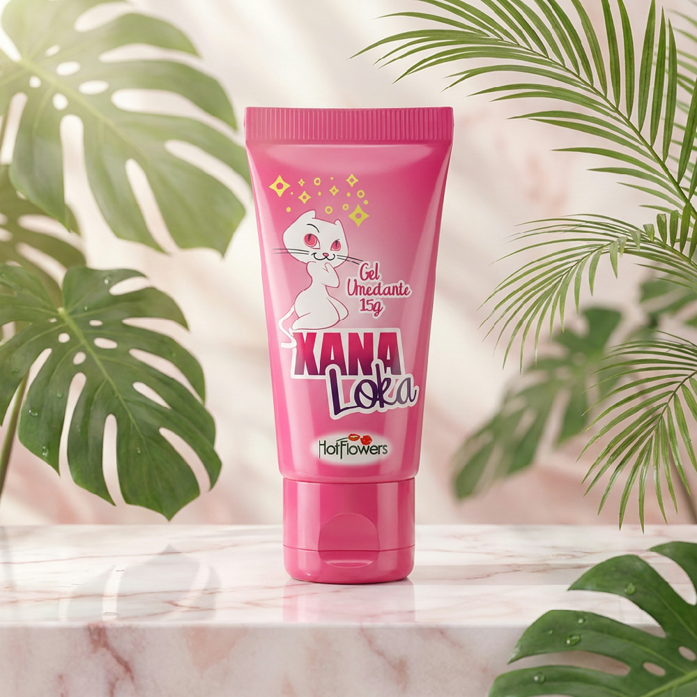 Gel Excitante Feminino Xana Loka 15g sobre uma base de m�rmore e folhas, destacando o design divertido do produto
