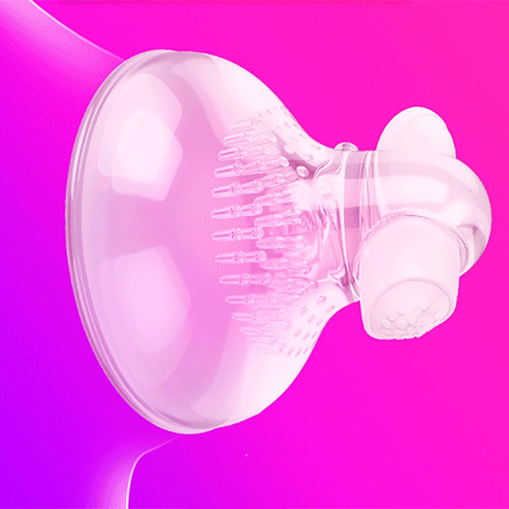 Massageador de Mamilo em Jelly Transparente em fundo vibrante, destacando a maleabilidade do material TPE
