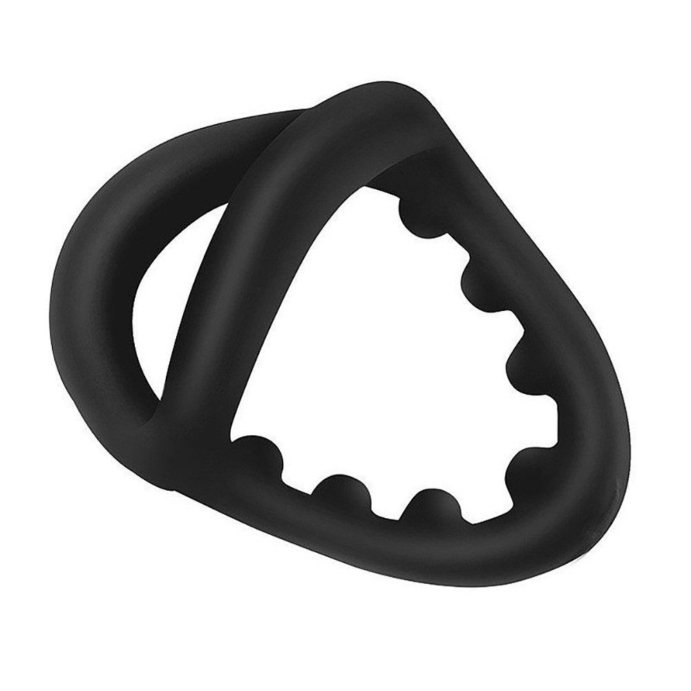 Vista lateral do anel peniano e escrotal de silicone preto, mostrando as ranhuras internas para est�mulo e o formato anat�mico