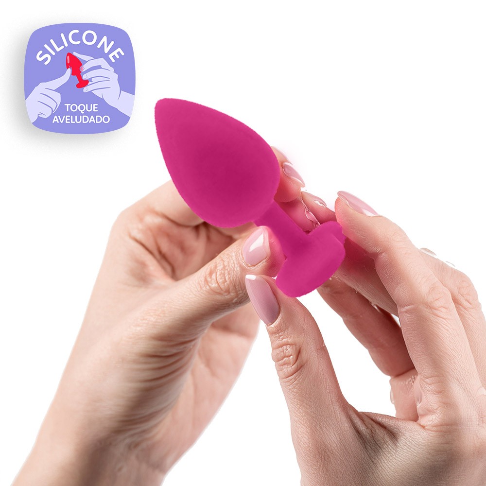 Detalhe do toque aveludado do Plug Anal Joia em Silicone Base Cora��o Pink, mostrando a textura suave e a cor vibrante