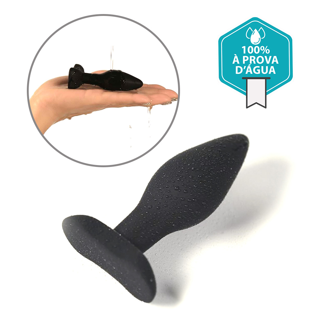 Plug anal c�nico preto em silicone, vista lateral com detalhes da flexibilidade e textura