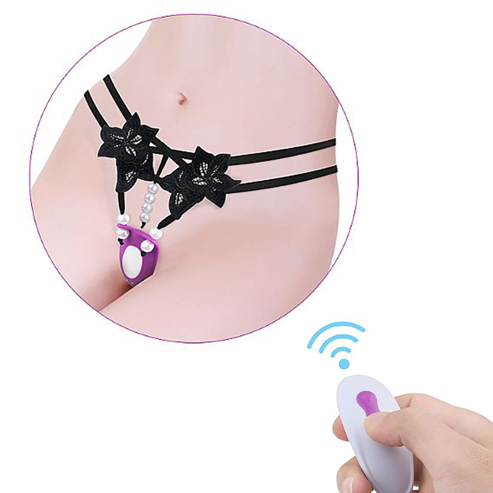 Vista lateral da Calcinha Vibrat�ria Rebecca Pink em corpo feminino, destacando o controle sem fio