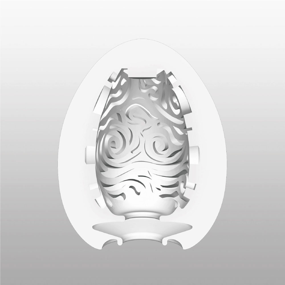Masturbador Tenga EGG Cloudy Hard Boiled em corte transversal mostrando a textura interna de nuvens para sensa��es fortes