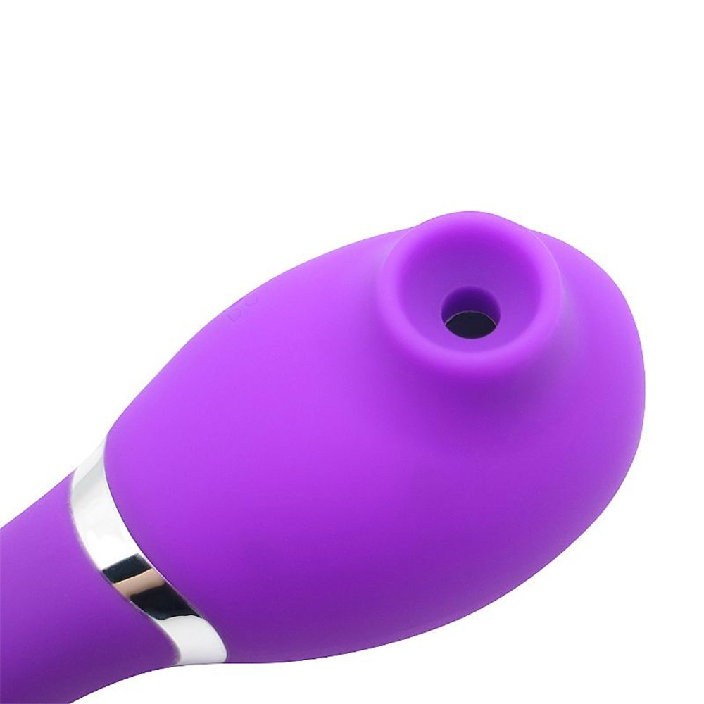 Vibrador Zaki Roxo em silicone, detalhe da ponta ergon�mica para estimula��o clitoriana precisa, com bot�es de controle