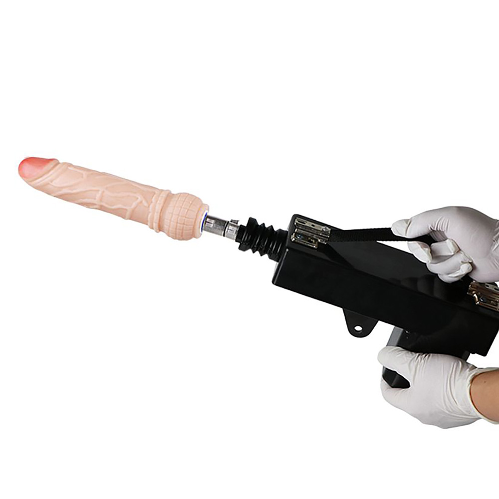 M�quina do Sexo Powerful Driving Fucking Machine sendo segurada com luvas, mostrando p�nis de silicone bege