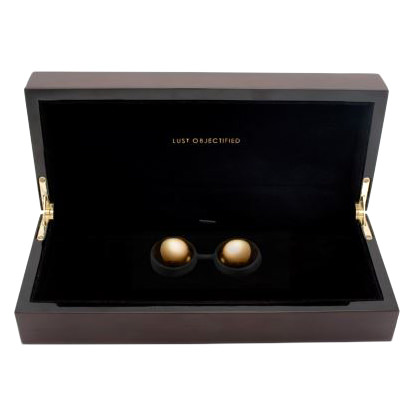 Luna Beads Bola de Pompoar Ouro exibida em sua caixa de luxo, destacando o refinamento do produto