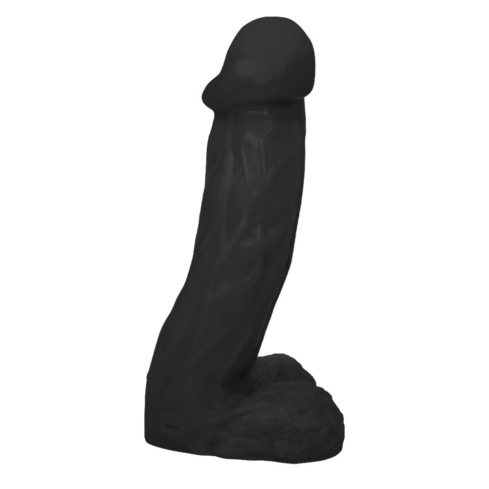 P�nis gigante e grosso flex�vel com escroto Valente em vista lateral, destacando curvatura e textura do material